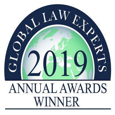 Logo featuring a stylized globe, the year 2019, and the English lettering “GLOBAL LAW EXPERTS,” “ANNUAL AWARDS,” and “WINNER.”