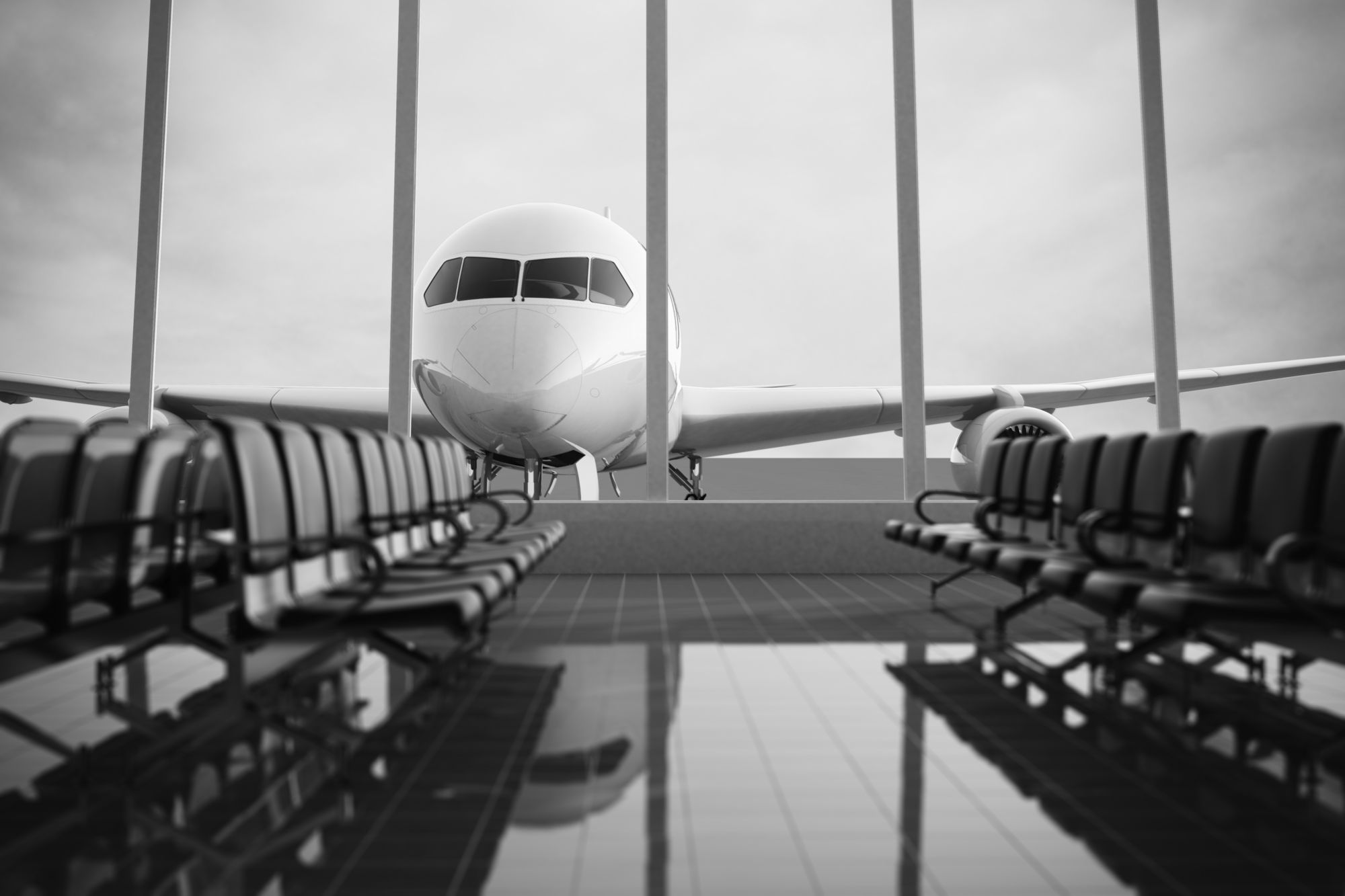 Front view of a passenger airplane behind a glass facade, framed by empty rows of seats in an airport terminal.